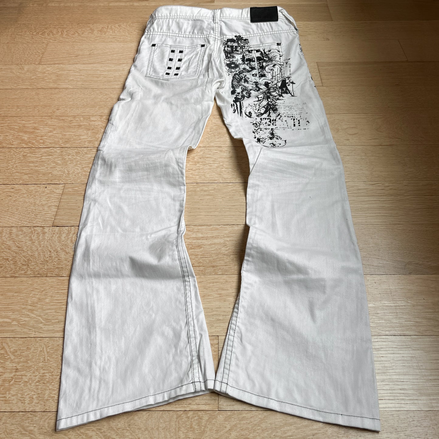 Tornado Mart “Tribal” Studded Flared Jeans