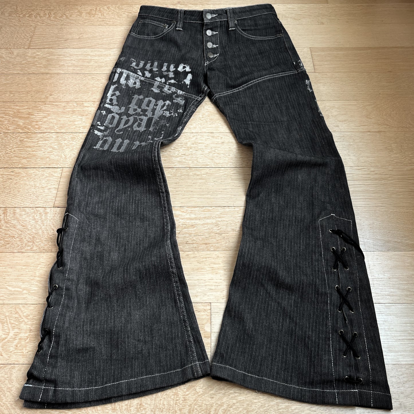 Tornado Mart “Script” Lace-Up Flared Jeans