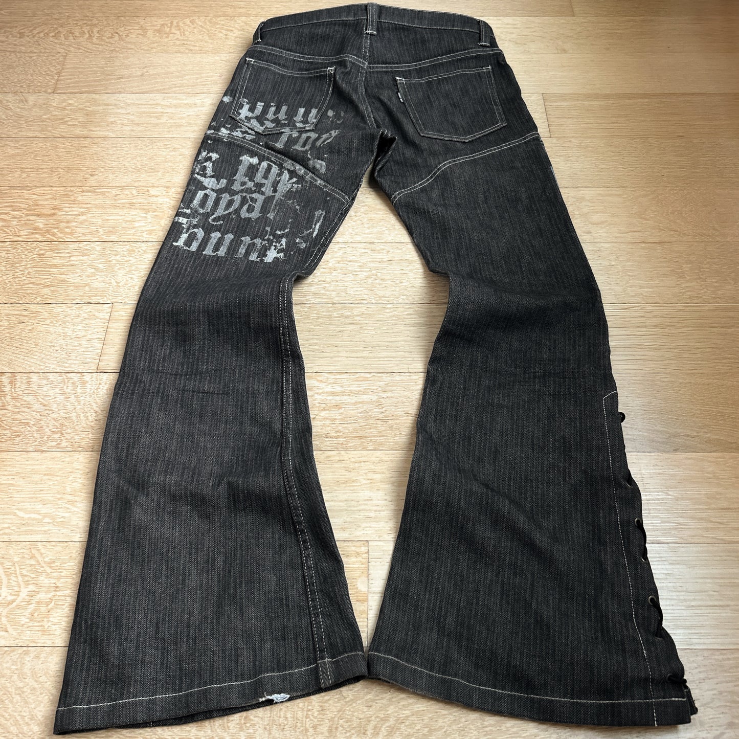 Tornado Mart “Script” Lace-Up Flared Jeans